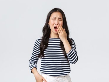 lifestyle-people-emotions-casual-concept-sleepy-tired-woman-working-late-office-close-eyes-yawning-want-go-bad-asian-girl-woke-up-early-need-coffee-stand-white-background_1258-59102