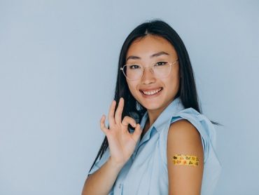 portrait-asian-woman-after-vaccination_1303-28697