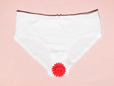 top-view-panties-with-paper-flower_23-2148163079