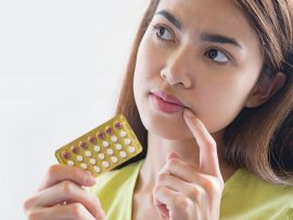 Woman hand holding a contraceptive panel prevent pregnancy