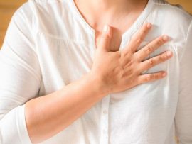 woman-is-clutching-her-chest_1150-14842